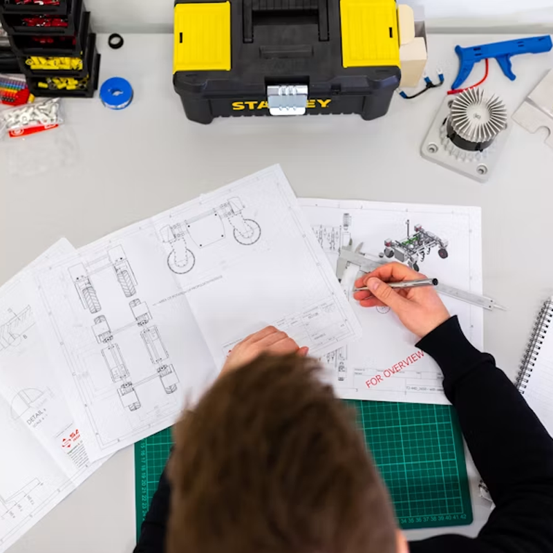 An associate working through the detail